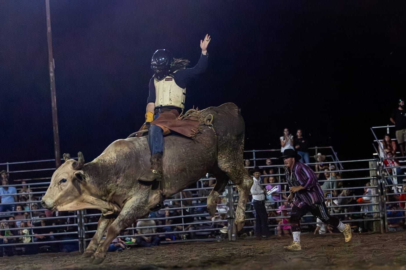 Alexander Lovelady bull riding in front of a crowd