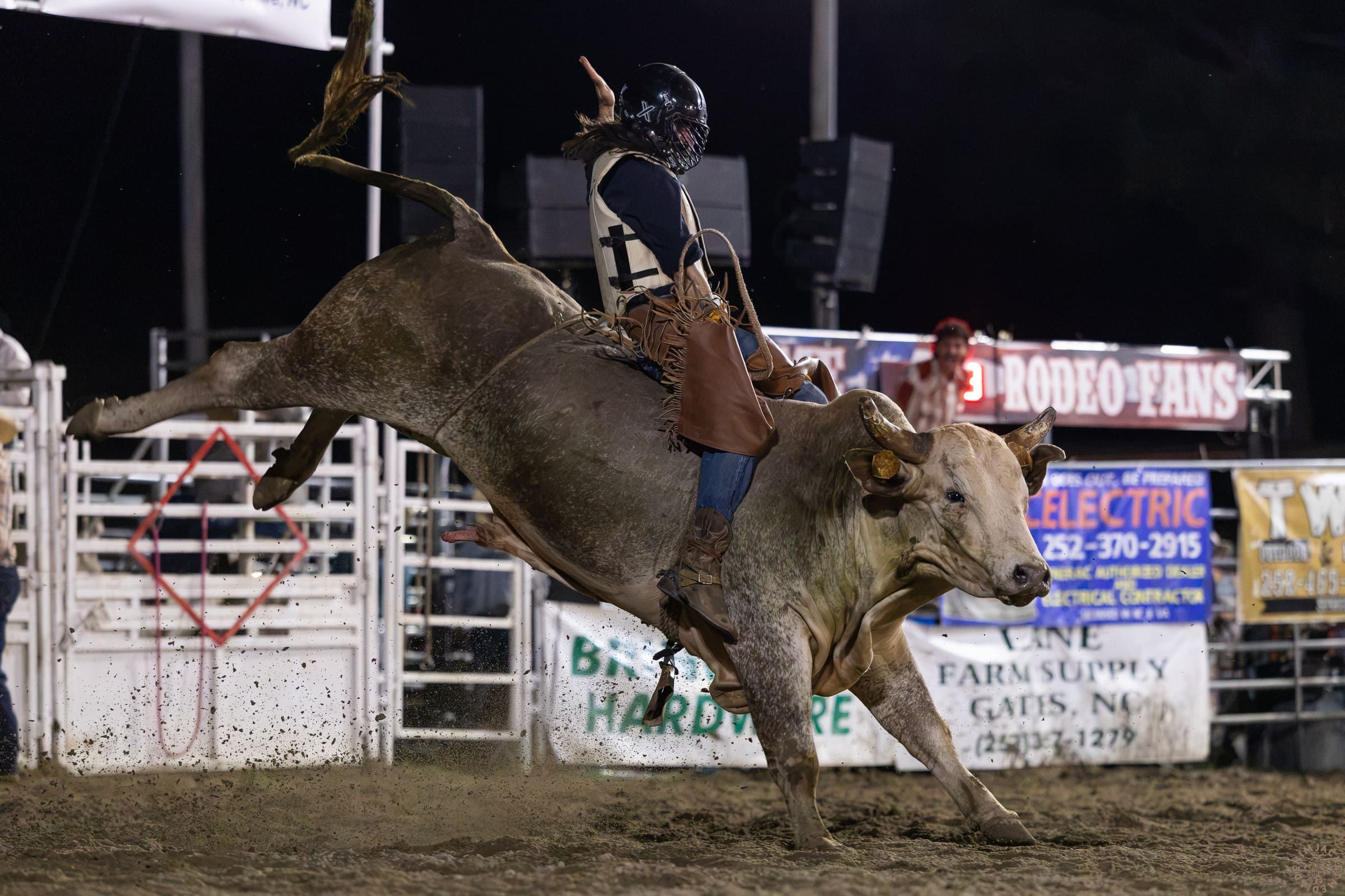 Alexander Lovelady riding a bull at True Grit Rodeo